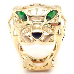 Cartier Panther Panthere 18k Yellow Gold Tsavorite Onyx Large Ring  Metal: 18k Yellow Gold Measurements:  Width: 1 1/4" Weight: 23.7 grams Stones: 2 tsavorite garnets in the eyes, onyx nose  Ring Size: European 55 US 7 1/4 Hallmarks: Cartier 750 55 ABM7XX(serial number omitted) T3437mhtdd  Dimensions reference the ring size and are not specific to the ring itself. Nose Ring Sizes, Cartier Panther, Tsavorite Garnet, Large Ring, Ring Metal, Buying Jewelry, Metal Rings, Cocktail Rings, Cartier