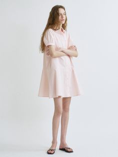 This is a trendy and feminine dress by ANEDIT that is made out of high quality and sturdy material. With distinctive mood of the design and modern feminine look, you can style it for your comfortable daily outfit.- Feminine mood and soft touch- Semi loose silhouette- Subtle puff sleeves and flared skirt- Out pocket detail on the chest Feminine Cotton Shirt Dress For Day Out, Pink Cotton Midi Dress For Daywear, Feminine Mini Length Shirt Dress For Work, Trendy Knee-length Shirt Dress For Daywear, Feminine Spring Cotton Shirt Dress, Feminine Cotton Shirt Dress For Spring, Pink Midi Length Shirt Dress For Daywear, Pink Relaxed Fit Mini Dress For Spring, Feminine Shirt Dress For Day Out, Midi Length