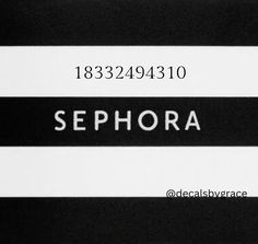 a black and white striped business card with the word sephora written in large letters