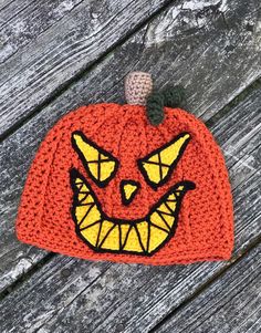 "This seriously spooky Jack-O-Lantern hat is sure to delight on a cold Halloween night! This haunting hat is all hand crocheted and embroidered from my original pattern. Please select desired size. Hat sizing info: 0-3 months: 15\" circumference 3-6 months: 17\" circumference 6-12 months: 18\" circumference 12 months-2T: 19\" circumference 3T-4T: 20\" circumference 4T-tween: 21\" circumference adult small: 22\" circumference adult medium: 23\" circumference adult large: 24\" circumference This h Halloween Costume Cap, Themed Halloween Cap, Spooky Hats For Halloween Costume Party, Playful Halloween Costume Cap, Themed Halloween Hat, One Size Fits Most, Themed Halloween Hat One Size Fits Most, Themed Halloween Costume Hats, Themed Halloween Hat, Fun Halloween Hats, One Size Fits Most