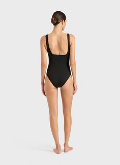 Margot one piece in black is a timeless classic swimsuit that has an elegant and flattering square neckline front and back. Self-lined in our ultra-soft Embodee™ fabric with high shaping power, Margot is like the little-black dress of swimsuits. It will be a core part of your swim wardrobe for years to come. Luxury fabric sustainably made in Italy.Garment sustainably and ethically made in Australia. Sleek Scoop Neck Swimwear For Poolside, Elegant Square Neck Stretch Swimwear, Second-skin Black Swimwear For The Beach, Chic Black Second-skin Swimwear, Second-skin Fit Black Swimwear For Beach, Elegant Square Neck Bodysuit, Sleek Black Second-skin Swimwear, Chic Black Swimwear With Square Neck, Chic Black Swimwear With Moderate Back Coverage