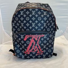 Host Pick Authentic, Louis Vuitton, In Collaboration With Kim Jones, Limited Edition Monogram Ink Upside Down Apollo Backpack. This Limited Edition Piece Is Crafted Of Lv's Classic Monogram Canvas In A Deep Navy Shade With White Logos, Red Zippers And Hardware, And Upside Lv Monogram In Red, Featuring: "Have A Vuitton Day" Underneath. Adjustable Carrying Straps, Front Pocket, Matching Inside Lining With Multiple Pockets. Lightweight And Strong. Includes Lv Dust Bag. Guaranteed Authentic. New, Ne Designer Backpack With Dust Bag, Luxury Monogram Canvas Standard Backpack, Designer Travel Backpack, High-end Black Backpack, Designer Everyday Bag With Logo, Designer Bags With Logo For Everyday Use, Black Monogram Canvas Bag With Logo, Black Monogram Canvas Bag With Monogram Print, Black Monogram Canvas Bags With Monogram Print