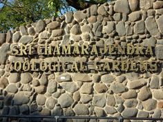 a stone wall with the words'sr graham jeldada technological gardens'written on it