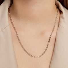 Our best-selling 14KT Gold Paper Clip Chain Link Necklace is available in multiple lengths. Curate your personal look with our charms. Shop Charms. Chain links measures 10mm x 3mm. Made in Italy. Please email us at info@annesisteron.com if you would like to custom order a different length. SKU FJPCN18-Y Metal Type 14KT Yellow Gold Chain Lengths Available 16", 18", 20", 22", 24", 26", 28", 30" White Gold Paperclip Chain Necklace For Formal Occasions, Formal White Gold Necklace With Paperclip Chain, Formal White Gold Paperclip Chain Necklace, Sterling Silver Paperclip Chain Necklace For Formal Occasions, Sterling Silver Paperclip Chain Necklace For Formal Events, 14k Gold Box Chain Charm Necklace, Formal Sterling Silver Paperclip Chain Necklace, Classic Formal Charm Necklace, Classic Charm Necklaces With Adjustable Chain For Formal Occasions