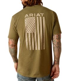 From Ariat&#x2C; this t-shirt features:Crew necklineShort sleeves"Ariat" logo and flag screen print on the front and backSlightly longer hem that looks great tucked inPullover constructionCotton/polyesterMachine wash/tumble dryImported. Ariat Logo, Mens Tee Shirts, Dillard's, Screen Print, Mens Tees, Looks Great, Screen Printing, Work Wear, That Look