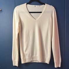 Women's Uniqlo V-Neck Cashmere Ivory Sweater Size M, Please See Photos. Excellent, Like New Condition, Never Worn (No Tags, Unfortunately!). Comes From A Non-Smoking Home. Measures 25" From Shoulder Seam To Bottom Hem And Is 19" From Armpit To Armpit. I Have A Couple Other Uniqlo V-Neck Sweaters Available That Are Cotton/Cashmere Blend Of The Same Size--Have A Look! Thank You So Much! Classic Cream V-neck Sweater For Spring, Casual Off-white V-neck Sweater, Uniqlo Sweater, Ivory Sweater, Uniqlo Women, Thank You So Much, Uniqlo, Vneck Sweater, Sweater Sizes