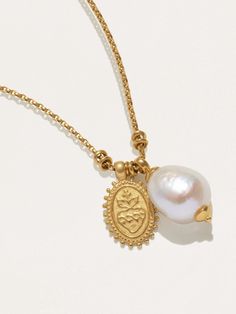 A beautiful little piece of jewelry, a perfect complement to a stunning bride or groom.This is the perfect necklace for a special woman who loves to be both romantic and bold. This piece would make a great addition to your bride’s wardrobe. Gold Spiritual Necklace With Pearl Drop, Spiritual Gold Necklaces With Pearl Drop, Spiritual Gold Jewelry With Pearl Charm, Spiritual Gold Necklace With Pearl Drop, Heart Charm Pendant Jewelry For Wedding, Yellow Gold Pearl Chain Jewelry For Wedding, Wedding Yellow Gold Jewelry With Pearl Chain, Exquisite Gold Pearl Necklace For Anniversary, Elegant Yellow Gold Necklace For Marriage