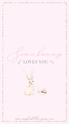 a pink card with an image of a bunny sitting next to a cupcake on it