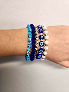 Blue bracelet stacks. 3 - 5 beaded strands per stack. Multi material beads on elastic sting. One size fits all. Please select the style you would like before proceeding to checkout! Prices are based on bead material and size. Adjustable Stacked Blue Bracelets, Blue Stacked Beaded Bracelets, Blue Stacked Bracelets With Round Beads, Trendy Blue Stackable Stretch Bracelet, Trendy Blue Stretch Bracelet With Spacer Beads, Blue Stacked Bracelets As Gift, Blue Stacked Bracelets For Gift, Blue Stacked Bracelets Gift, Blue Stacked Round Bead Jewelry