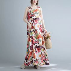 Discover Timeless Elegance and Comfort Step into a season of breezy style with our Floral Print Cotton Linen Long Dress. Perfectly blending vintage charm with modern comfort, this dress is your ideal companion for all your warm-weather adventures. Designed for women who cherish both style and comfort, this dress promises to keep you cool and stylish, no matter where the day takes you. Product Features Fabric: Premium cotton blend for ultimate comfort and breathability. Fit: Loose and flowing with a flattering A-line silhouette. Design: Elegant floral print and a classic O-neck for a touch of sophistication. Length: Ankle-length to suit all occasions, from casual outings to evening strolls. Convenience: Easy to wear with a pullover closure type, making it a hassle-free addition to your ward Linen Long Dress, Floral Print Dress Long, Long Linen Dress, Floral Dresses Long, Cotton Linen Fabric, Elegant Floral, Summer Floral, Style Icon, Floral Print Dress