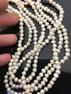 quantiy: 1 strand pearl jewelry: long pearl necklace pearl body: AA+ pearl grade: AA+ pearl luster:high pearl shape: potato shape pearl size(actual size): 5-5.5mm pearl length: 60 inches pearl colour: white Back to Other Jewelry Section 01: "Tahitian,Akoya,Sea Pearl" Section: https://www.etsy.com/shop/WenPearls?section_id=15806339 02: "Potato/Near Round Pearl" Section: https://www.etsy.com/shop/WenPearls?section_id=16378067 03: "Round Pearl" Section: https://www.etsy.com/shop/WenPearls?section_id=16163245 04: "Rice/Oval/Teardrop Pearl" Section: https://www.etsy.com/shop/WenPearls?section_id=16190184 05: "Nugget Pearl" Section: https://www.etsy.com/shop/WenPearls?section_id=18893039 06: "Button/Coin/Rondelle Pearl" Section: https://www.etsy.com/shop/WenPearls?section_id=18893043 07: "Keshi Pearl White Oval Beads Pearl Necklace, White Akoya Pearl Necklace In Pear Shape, White Akoya Pearl Necklace, White Oval Pearl Necklace, White Oval Beads Single Strand Pearl Necklace, White Single Strand Pearl Necklace With Oval Beads, Leather Pearl Jewelry, Long Pearl Necklace, Pearl Necklace Wedding