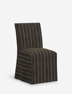 a black and white striped chair with a brown stripe upholstered on the back