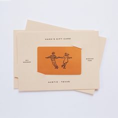 two cards with an orange envelope and hand - drawn image of people holding hands, on top of each other