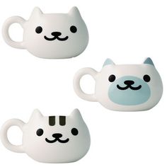 two white ceramic mugs with black eyes and ears