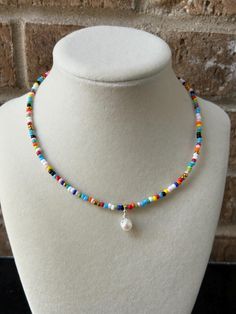 Rainbow seed bead choker with pearl drop accent. Rainbow Beaded Choker With Round Beads, Adjustable Rainbow Choker With Round Beads, Multicolor Single Strand Beaded Choker, Rainbow Round Beads Adjustable Choker, Multicolor Polished Bead Choker, Crystal Lake, Christmas Deals, Beaded Choker, Pearl Drop