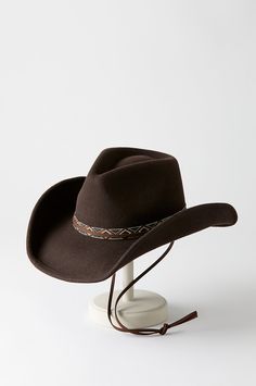 Saddle up and get ready to ride off into the sunset in the Big Sky hat, made from soft, breathable wool felt. With its western styling—including a chin cord and woven hatband—this shapeable hat is the perfect accessory to your well-loved jeans, cowboy boots, and dependable steed. With an adjustable sweatband for a personalized fit. Modern Cowboy Hat, Woman In Cowboy Hat, Cowboy Hats Aesthetic, Cowboy Hat Photography, Cowbow Hat, Aquarius Outfits, Custom Cowgirl Hats, Cowboy Hat Aesthetic, Jeans Cowboy Boots