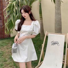 Size(cm) Length Bust Waist Shoulder Sleeve S 80 84 68 34 29 M 81 88 72 35 30 Brand：Orchidmet Product Type:Midi Dress Style:Elegant Sleeve Length:Short Sleeves Collar-line:Square Collar Waist Type: Natural Pattern Type：Solid Package:1*Dress Size tips: 1. Manual measurement, around 1cm difference allowed. 2. Due to reason of light and display,there may be a slight color difference between the picture and real product . Grad Outfits, Korea Dress, Dress Korea, Puff Sleeve Mini Dress, Midi Dress Style, Stil Elegant, Kawaii Clothes, Patterns In Nature, Mini Dress With Sleeves