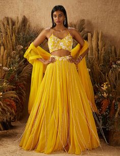 Shloka Khialani-Yellow Jaune Embellished Lehenga Set-INDIASPOPUP.COM Purple Lehenga, Blouse Yoke, Haldi Outfit, Yellow Lehenga, Embellished Blouse, Draped Skirt, Embroidered Neckline, Layered Skirt, Dry Clean Only