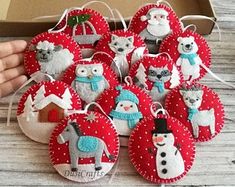 handmade christmas ornament with snowman, sheep and santa clause on them