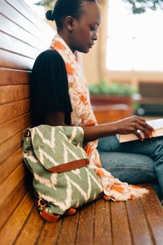 Whether you're commuting to work or traveling the world, do it in style! The ultimate accessory for anyone on the go who values fashion and function with its multiple wearing options: wear it as a purse, backpack, or crossbody bag. This ikat screen printed bag features two adjustable web straps, with swivel snaps at both ends, ensuring maximum comfort and flexibility. The exterior has a convenient zippered pocket for easy access to your essentials, while the flap adds a touch of elegance with it Screen Printed Bags, Commuting To Work, Chain Scarf, Candle Wall Decor, Sustainable Kitchen, Purse Backpack, Traveling The World, Commute To Work, Accessories Bags Purses