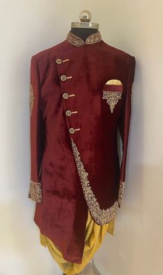 This designer indo western sherwani comes with Cowl kurta. This is velvet sherwani with heavy zardosi work . Colour options available. Customisation available. Includes- cowl style kurta, pyjama and sherwani Groom's Long Sleeve Embroidered Sherwani, Bollywood Embroidered Sherwani For Groom, Dabka Embroidered Sherwani For Groom At Eid, Dabka Detailed Sherwani For Groom At Eid, Dabka Sherwani For Groom At Eid, Eid Groom Sherwani With Dabka Detailing, Embroidered Long Sleeve Kurta For Groom, Eid Sherwani With Dabka For Groom, Long Sleeve Sherwani With Dabka Work For Groom