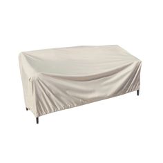 an outdoor furniture cover on top of a table