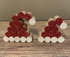 a pair of shoes made out of cork with red and white sequins on them