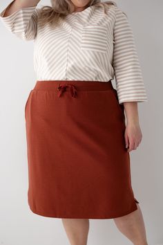 Meet the 'Lauren' Everyday Knit Skirt, the ultimate blend of comfort and style! Designed with soft, high-quality knit fabric, this skirt is your next go-to piece for everyday wear – perfect for running errands, meeting friends for coffee, or simply lounging at home. For a casual daytime look, pair this skirt with a simple tee and sneakers! Exclusively designed by us with you in mind. Taupe 48% Cotton 48% Polyester 4% Spandex Rust 60% Cotton 40% Polyester Hand Wash Cold Do Not Bleach Hang to Dry Low Iron if Needed Do Not Dry Clean Fully Lined 2" Side Slits Model in Rust Height 5'9" | Wearing Size Small Model in Rust Height 5'8" | Wearing Size 1X Model in Taupe Height 5'5" | Wearing Size Small Please carefully measure a similar item before placing your order to allow for the best fit and als Meeting Friends, Meet Friends, Simple Tees, Layered Tops, Low Iron, Skirt Leggings, Knit Skirt, Spring Collection, Blouse Dress