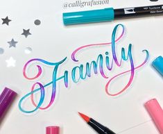 the word family is surrounded by markers and crayons on a white surface with stars