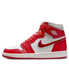 The iconic Air Jordan 1 High OG 'Newstalgia Chenille' Women has been refreshed with subtle, yet visually striking details that are sure to make a statement. Combining a classic leather upper in a combination of white and Varsity Red overlays along the toe and heel area, the design is complete with high-cut collars lined with soft terry cloth for an extra comfortable fit. What truly makes this shoe stand out are its signature Swooshes created with red chenille fabric, as well as the replace of st Logo Wings, Jordan Retro 1, Shoes Stand, Womens Air Jordans, Popular Sneakers, Jordan 1 High Og, Air Jordan Retro, Jordan Sneakers, Air Jordan 1 Retro High Og