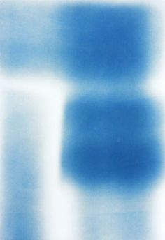 a blurry image of blue and white colors