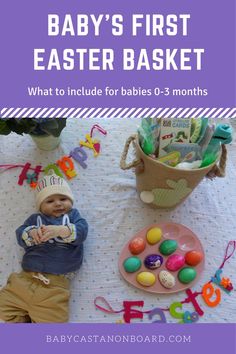 a baby's first easter basket with eggs and toys on the table in front of it