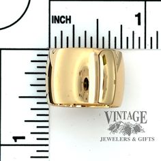 This exquisite ring band is made with 18 karat yellow gold and has an extra wide 14 mm width to make a bold statement. The low dome profile adds a gentle touch to the design, making the ring comfortable and elegant. Finger size 6.5. 18 karat, extra wide 14 mm width, low dome profile, ring band Finger size 6.5 Formal Yellow Gold Open Band Wide Ring, Gold Wide Band Ring In Fine Jewelry Style, Classic Gold Wide Band Ring With Open Shape, Classic Gold Wide Band Ring With Open Band, Gold Dome Ring With Open Band In Timeless Style, Modern Wide Band Ring For Anniversary, Modern Open Band Wide Ring For Formal Occasions, Modern Wide Band Open Ring For Formal Occasions, Hallmarked Wide Band Dome Ring For Anniversary