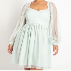 The Eloquii Sweetheart Bodice Tulle Dress In Mint Green Is A Dress Made Of Polyester And Tulle. It Features A Solid Pattern, Long Puff Sleeves, And A Sweetheart Neckline. The Dress Has A Pullover Closure And Is Adorned With Layered Accents. It Is A Fit And Flare Style Dress With A Short Length And Is Perfect For Formal Occasions Such As Weddings Or Cocktail Parties. Its Been Tried On But Never Worn. In Great Condition. Like New. See Photos True To Size Green Mini Dress, Plus Size Designers, Long Puff Sleeves, Tulle Dress, Style Dress, Formal Occasion, Puff Sleeves, Dress Making, Mint Green