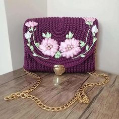 This Purple Knitting Bag is the perfect accessory for any stylish woman. Hand-woven from cotton and wool, this small crossbody bag is cute and unique. It features a long strap which makes it comfortable to wear on the shoulder or across the body. The bag also comes providing you with enough space to carry your phone, keys, cash and cards . This eye-catching bag is perfect for making a statement. It is lightweight and comfortable to wear, and the vibrant red color will add an instant touch of style to any ensemble. The wool and cotton blend fabric ensures that this bag will last you through many seasons of fashion. With its classic shape, this small handbag can be dressed up or down for any occasion. Whether you're headed to work e heading out for a night on the town or just running errands Handmade Handheld Purple Shoulder Bag, Handmade Purple Handheld Shoulder Bag, Crochet Shoulder Bag As Gift, Handmade Trendy Purple Bag, Trendy Handmade Purple Bag, Hand Knitted Pouch Shoulder Bag For Daily Use, Daily Use Crochet Clutch Shoulder Bag, Crochet Clutch Shoulder Bag For Daily Use, Hand Knitted Pouch Shoulder Bag