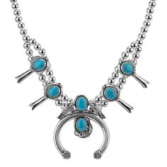 This naturally colorful Southwestern Sterling Silver necklace features 6 genuine oval cut Kingman Turquoise gemstones with a Naja design at the center and squash blossom stations in between a double row of round silver beads. It is 17" long and includes a convenient 3" extender chain and is secured with a lobster claw clasp. Turquoise symbolizes protection, healing, and communication. Its beautiful blue-green color and rich cultural history make it a favorite in both jewelry and spiritual practi Turquoise Jewellery, Turquoise Squash Blossom, Squash Blossom Necklace, Squash Blossom, Gemstone Cabochons, Creating Jewelry, Jewelry Show, Western Jewelry, American West