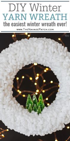 a knitted wreath with trees on it and the words yarn winter yarnwrath