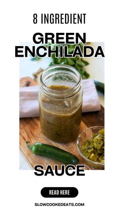 green enchilada sauce in a glass jar on top of a wooden cutting board