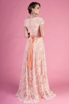 "Salmon lace maxi dress with side pockets ➤ Features > dress length: 155cm / 61.\" > short sleeves > v-shaped neckline > separated belt > side pockets ➤ Sizing My Size Guide in FAQ section below will help you define the perfect size match. The item can also be made according to your measurements - just message them to me. ➤ Delivery Your item is made-to-order and will be ready within 2-7 days. Average delivery times: > North America: up to 1-2 weeks > New Zealand, Australia: Floor-length Lace Dress For Bridesmaid, Lace Bridesmaid Gown Floor-length, Lace Floor-length Bridesmaid Gown, Bridesmaid Maxi Lace Dress With Lace Trim, Floor-length Lace Bridesmaid Gown, Maxi Length Wedding Gown With Lace Back, Short Sleeve Lace Dress With Lace Back, Bridesmaid Maxi Dress With Lace Sleeves, Bridesmaid Maxi Dress With Scalloped Lace