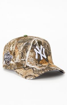 The NY Yankees World Series 9FORTY Snapback Hat is a stylish and adjustable cap that celebrates the team's championship legacy. Featuring the iconic Yankees logo and World Series branding, this hat offers a comfortable fit and a classic look for any fan.


	Realtree print
	NY Yankees embroidery
	World Series side patch
	Adjustable snapback closure Hat Outfit Men, New York Yankees Hat, Snapback Hats Men, New York Yankee Hat, Yankees World Series, Yankees Cap, Yankees Hat, Leo Rising, Camouflage Hat