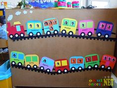 a cardboard train with children's names on it