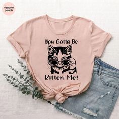 You Gotta Be Kitten Me Shirt,Funny Cat T-Shirt,Kitten Birthday Shirt,Cat Owner Gifts,Cat With Sunglasses Tshirt for Men Women,Girl Cat Shirt 👉How Do I Order👈 1️⃣ Please review all the information provided before placing an order 2️⃣ Select the shirt size using the drop down menu. 3️⃣ Select the color of the shirt using the following drop down menu. * * Different styles of shirts may have different shades of same color choice due to different manufacturer brands. * * For this reason, we recomme Summer Graphic Tee With Cat Design, Trendy Cat Design T-shirt For Spring, Trendy Hello Kitty Print T-shirt For Summer, Trendy Hello Kitty Print Summer T-shirt, Summer Pink T-shirt With Cat Design, Trendy Pink Cat Print T-shirt, Pink Cat Design Tops For Summer, Trendy Pink Tops With Cat Design, Pink Tops With Cat Design For Summer