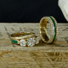 "Specifications (Men's Ring): - 2.25mm Yellow Gold (Or Metal of your Choice) With 1.75mm Round Lab Diamonds - 1.5mm Full Malachite - 2.25mm Yellow Gold (Or Metal of your Choice) With 1.75mm Round Lab Diamonds The total width of this ring is 6mm, Comfort Fit Specifications (Women's Ring): Yellow Gold Gold (Or Metal of your Choice) Main Ring with: - 6.5mm (1ct), Round Moissanite Center Stone - 2 x 5mm (1ct total) Round Moissanite Side Stone - Full Malachite Channel This ring comes in a Standard Fi Luxury Green Channel Set Rings, Luxury Emerald Rings With Channel Set, Luxury Emerald Rings Channel Set, Gold Emerald Ring Channel Set, Three Diamond Ring, Band With Diamonds, French Cut, Malachite Stone, Round Moissanite