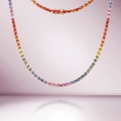 Beautiful Diamond Tennis Necklace. A staple in your jewelry collection. Handmade in New York City of polished 14k white gold. This tennis necklace showcases a delicate 4 prongs in line chain embellished with dozens of shimmering multi color sapphires ( NO Lab Made). Quality to us is important and that is why we hand se Rainbow Tennis Necklace, Luxury Multicolor Multi-stone Necklaces, Luxury Multicolor Necklace For Formal Occasions, Luxury Multicolor Necklaces For Formal Occasions, Luxury Multicolor Jewelry For Formal Occasions, Luxury Round Multicolor Necklaces, Luxury Multicolor Round Necklace, Luxury Multicolor Round Necklaces, Rainbow Things