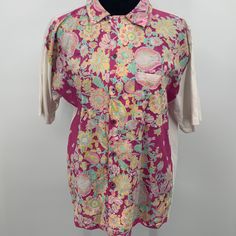 Lovely New With Tag Vintage Fiorucci Shirt. Has Price Tag - Never Worn! Beautiful Pink Floral Pattern With White Sleeves And Back. 20 In Across Top Chest. Medium Or Large Size Shirt Size Tag Not Included On Garment. Excellent Condition. About A 16 In Neck. Multicolor Collared Shirt For Daywear, Pink Casual Hawaiian Shirt With Collar, Pink Printed Shirt With Camp Collar, Multicolor Cotton Top With Collared Neckline, Casual Multicolor Daywear Shirt, Pink Top With Camp Collar And Button Closure, Casual Multicolor Shirt For Daywear, Pink Short Sleeve Tops With Placket, Pink Top With Button Closure And Camp Collar