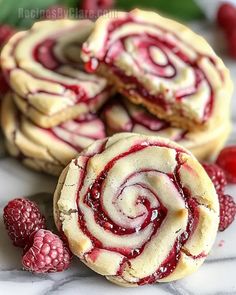 raspberry swirl cookies are stacked on top of each other