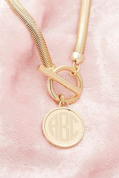 Please note that all sales are final. The Brook & York Custom Monogram Herringbone Toggle Necklace is sure to keep your fashion style right on trend. This monogram necklace is perfect to wear on its own or layered with other necklaces. Important Customization Information: A brook & york representative will reach out via email to confirm desired customization after purchase. Production time of your piece does not start until after your customization has been received. Your order will be cancelled if your customization is not confirmed within 1 week from purchase. brook & york- As an American-inspired, American-made company it is important to us that all of our jewelry is made here in the USA with supreme care and loving attention to detail. We know that american style is ultimately a way of Toggle Necklace, Versatile Jewelry, Monogram Necklace, Custom Monogram, American Made, American Style, Herringbone, Color Coding, Gold Necklace