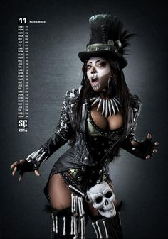 a woman dressed up as a skeleton wearing a top hat