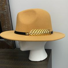 Tan Wide Brim Fedora Panama Hat With Gold Feathered Belt Buckle Detail Details: One Size Fits Most- Tie On Inside For Size Adjustment Material 65% Cotton 35% Polyester- Breathable, Lightweight, Comfortable For All Day Wear Indoors & Outdoors. Hat Circumference Approx 22-22.8", Approx Brim 3", Approx Deep 4.7" Nwot Condition- I'm Sole Owner Bought New & No Signs Of Wear Floppy Hats, Wide Brim Fedora, Gold Feathers, Mad Hatter, Wide Brimmed, Belt Buckle, Boho Outfits, Panama Hat, Belt Buckles