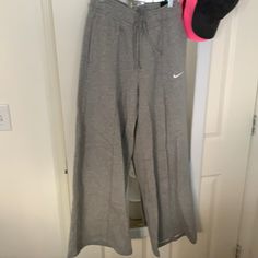 Never Before Work Nike Sweats Size Medium New With Tags Nike Cotton Loungewear Bottoms, Nike Cotton Bottoms For Loungewear, Nike Cotton Long Pants, Nike Cotton Pants For Spring, Nike Full-length Bottoms With Pockets, Nike Long Bottoms With Pockets, Nike Relaxed Fit Full Length Bottoms, Nike Wide Leg Cotton Sweatpants, Nike Wide Leg Pants With Pockets